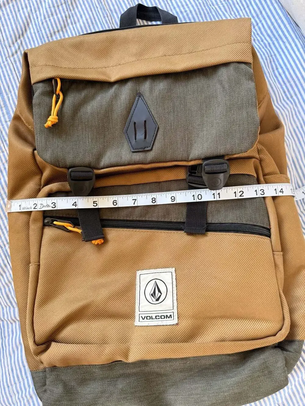 Volcom Brown and Green Flap Backpack with Buckle Straps excellent condition.